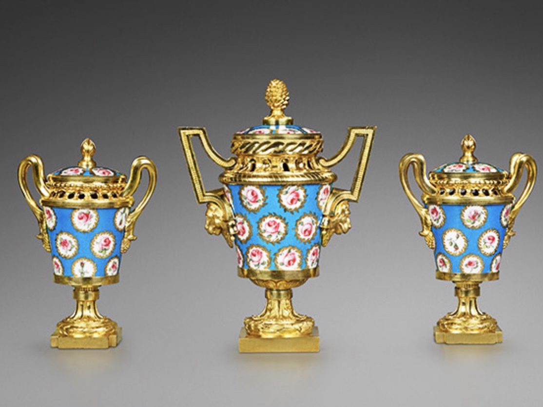 A LATE LOUIS XV GARNITURE OF THREE GILT BRONZE-MOUNTED SÈVRES POT-POURRI VASES (VASES À MONTER)